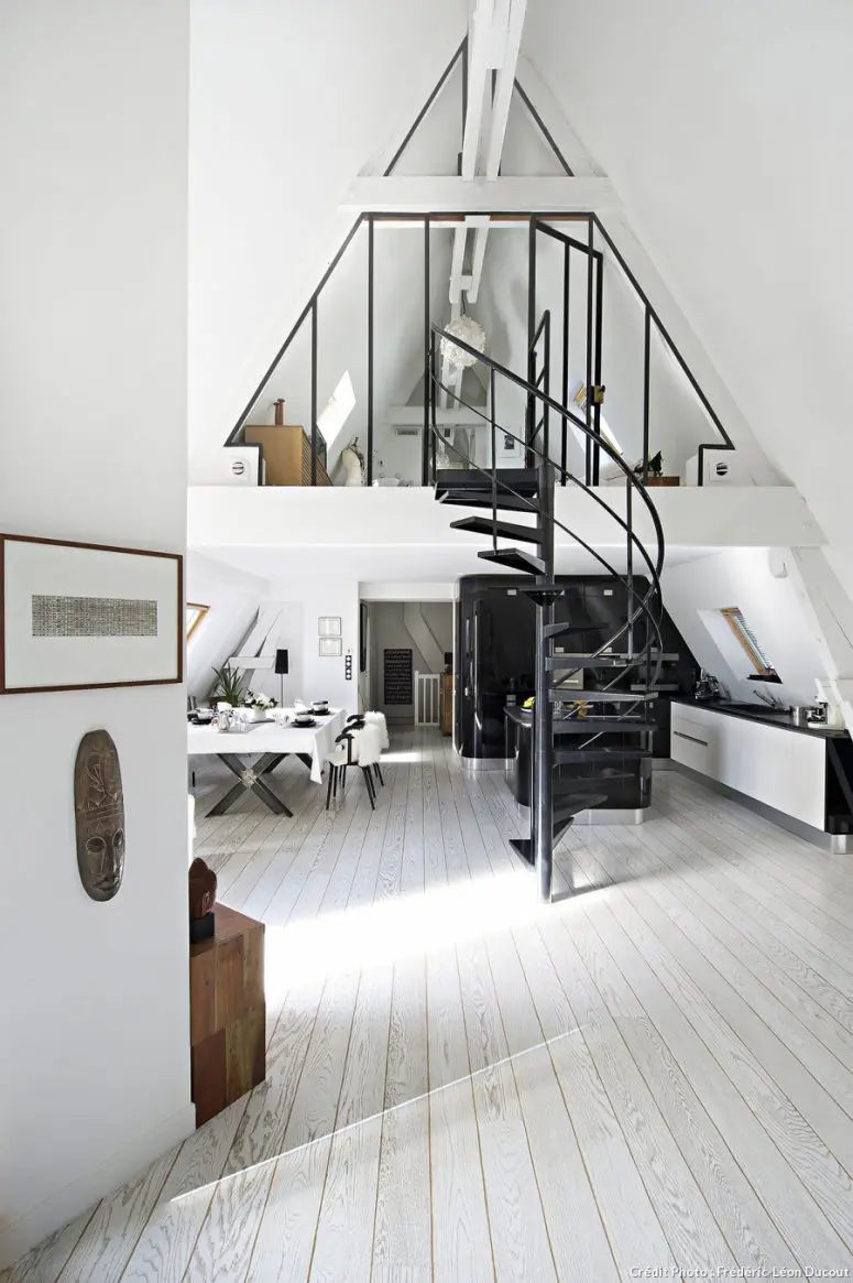 This attic apartment was divided into two floors sepaarting the public and private area