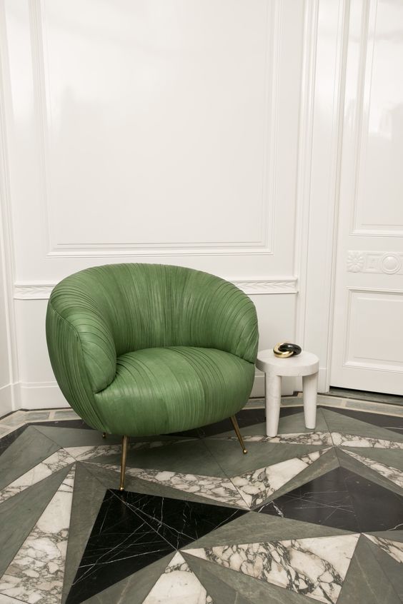 02 geometric marble floors and a statement green leather chair