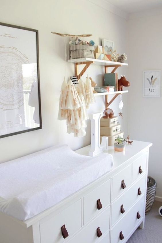 IKEA dresser hack into a diaper changing station with leather pulls
