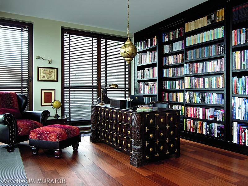 The home office has a double library and a traditional Indian desk