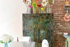 03 There’s a vintage-inspired sideboard with a patina finish