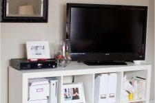 a Kallax unit has always been a perfect TV stand with a lot of storage space, it’s very comfortable for using it this way