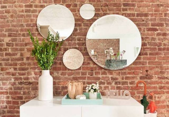 The exposed brick wall gives the space charm and character