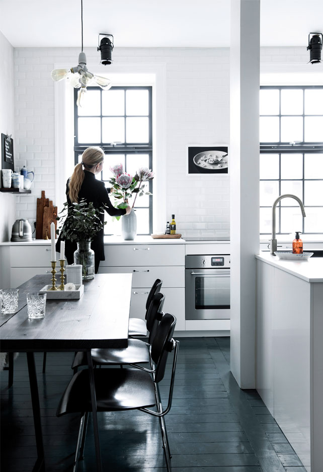 The kitchen furniture is a mix of modern items and flea market finds