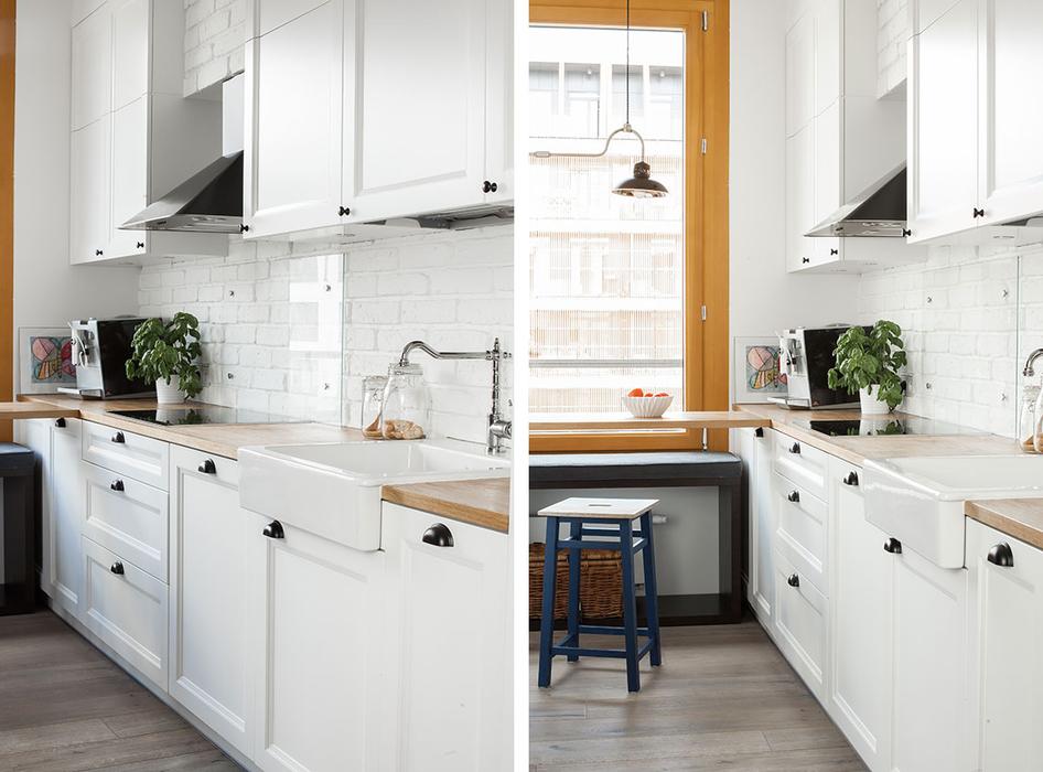 The kitchen cabinets are white ones with a mid century modern feel