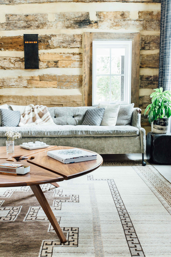 The walls are covered with the same reclaimed wood for coziness
