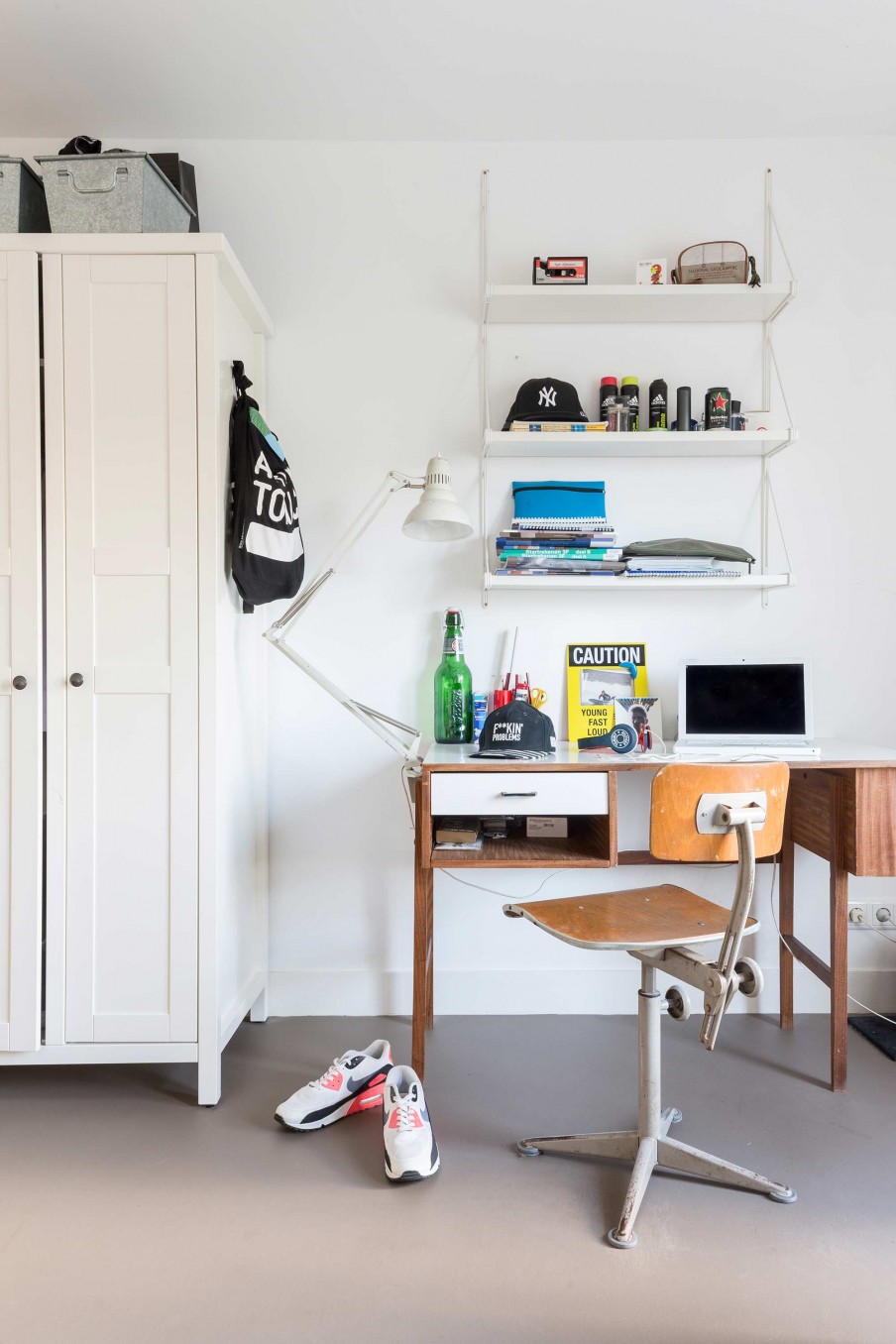 The home office corner is mid century modern with shabby furniture