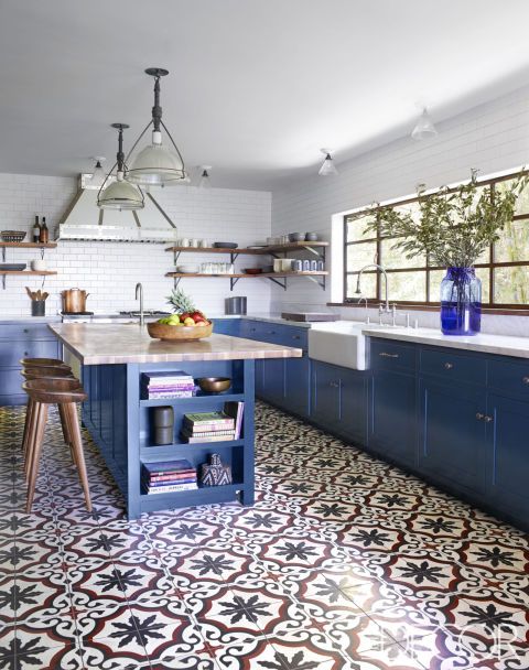 09 patterned mosaic tiles attract attention in this blue kitchen