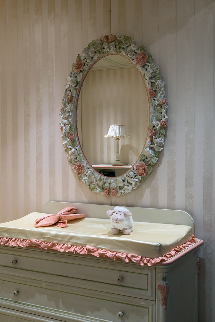 If you are decorating a nursery, you'll need this changing table and a mirror above it