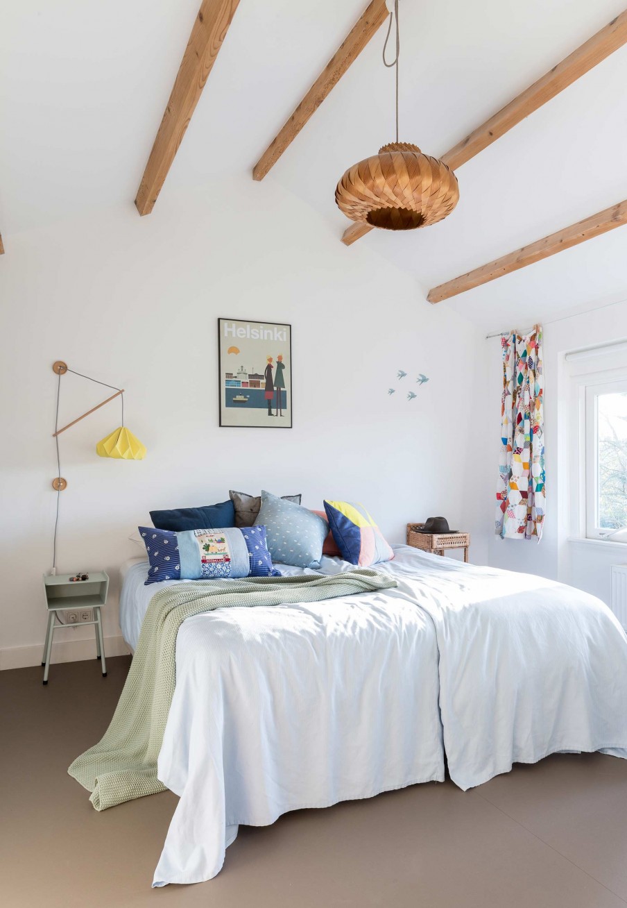 10 The master bedroom is serene and fun with crazy nightstands and bold accents