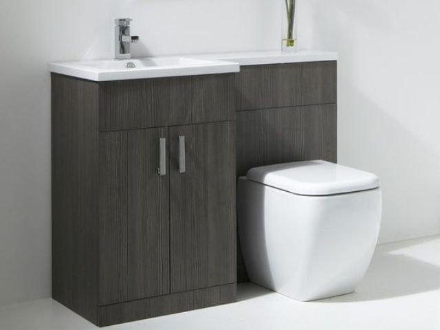 a basin and a toilet combined and clad with grey wood