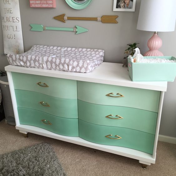 beautiful vintage dresser renovated into a changing table in ombre mint and white