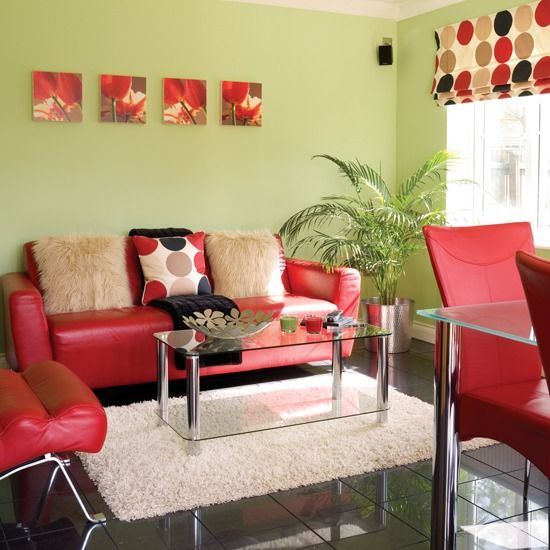 12 Bold red makes a statement against fresh green walls in this living room