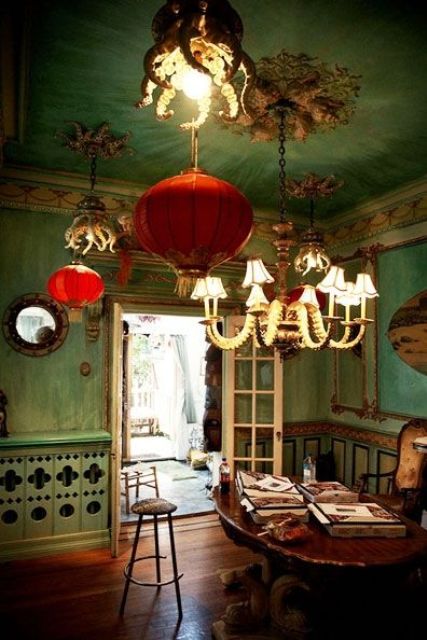 Pale green walls with red Chinese paper lanterns to make an accent