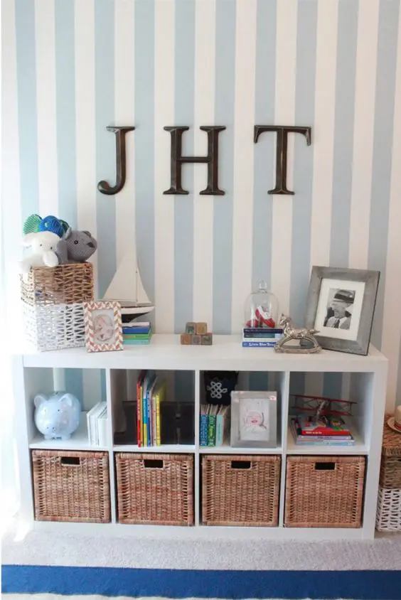 a Kallax shelf as a kids' room storage piece, finish it off with matching basket drawers that will add a cozy rustic feel to the space