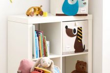 a Kallax unit with drawers for kids’ room storage is a stylish and airy idea for any space, it looks nice, simple and is comfy in using