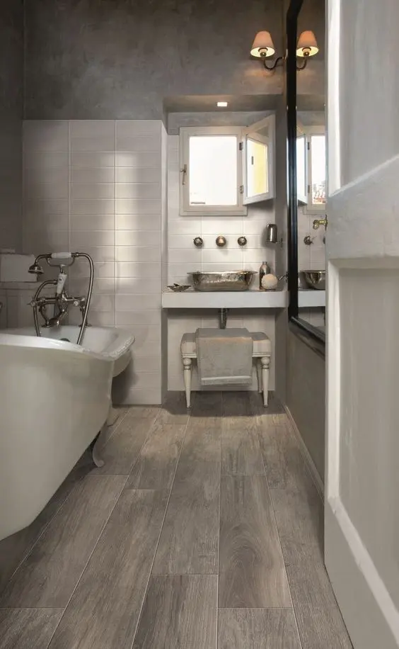 21 such wood-look floor tiles are perfect for a bathroom where it’s often humid
