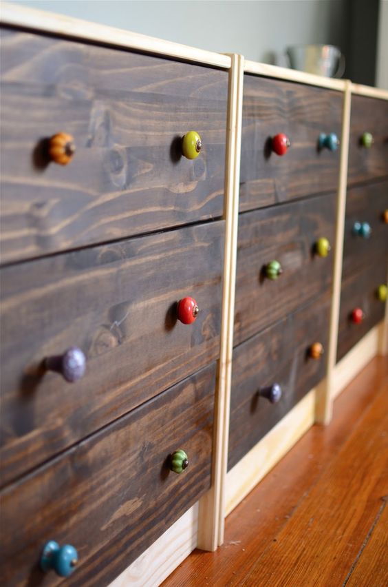 wood clad IKEA Rast dresser with colorful knobs