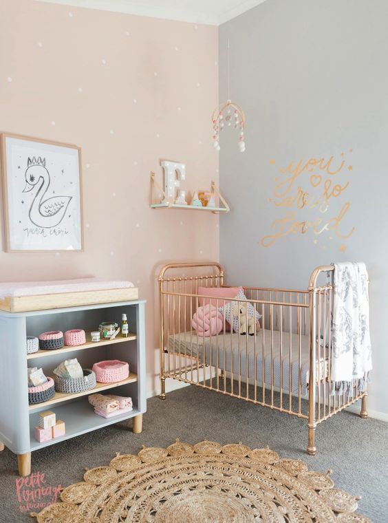 crib with a glam changing table with an open shelving