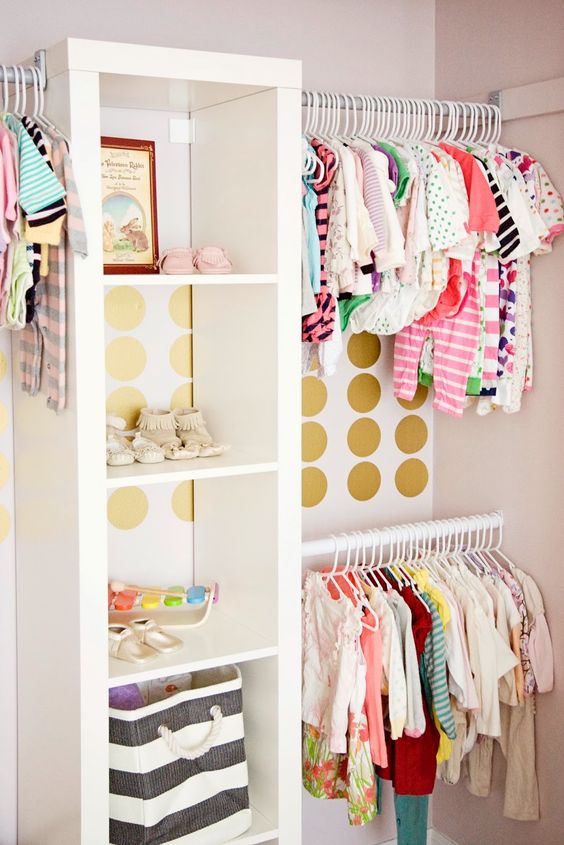 colorful glam closet with gold polka dots