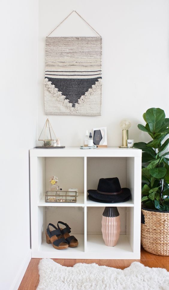 an IKEA Kallax shelf will be a perfect fit for a walk-in closet, you may store anything from shoes to accessories in it and on it