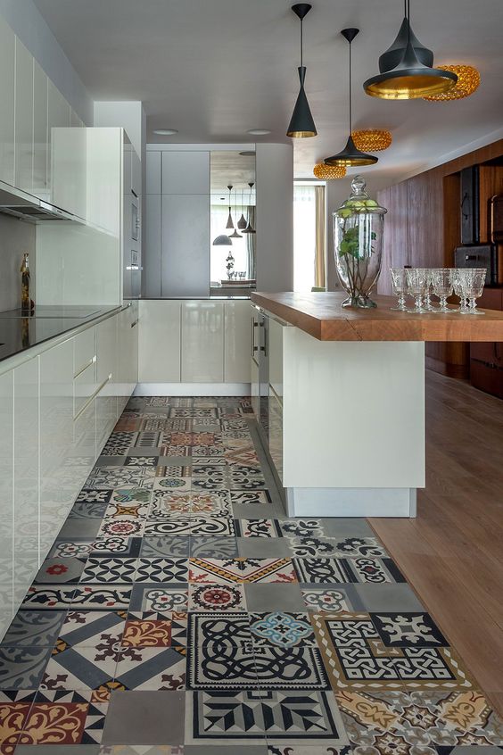 bold patterned patchwork tiles and wooden floors