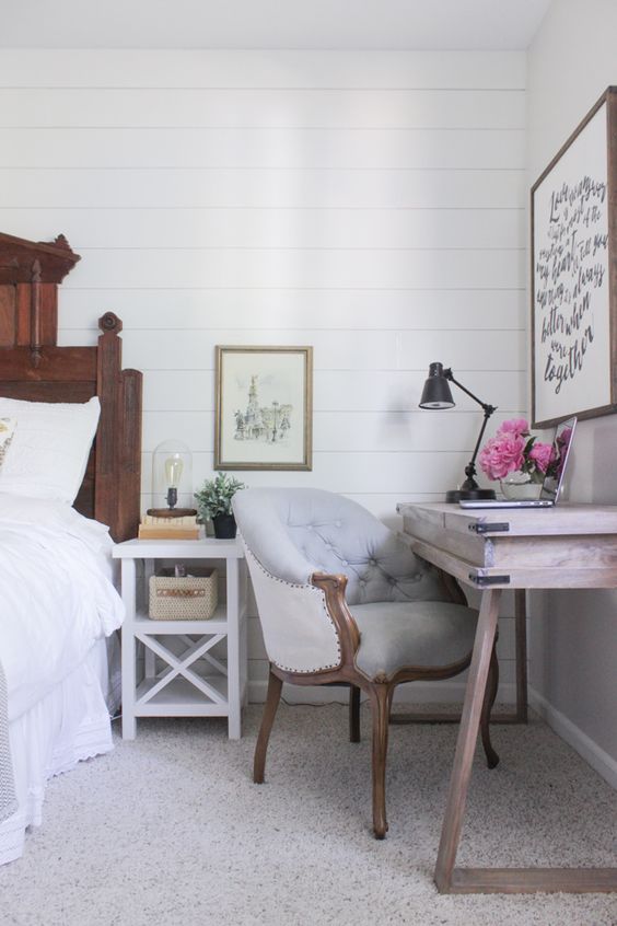 rustic bedroom with a wooden desk in the corner