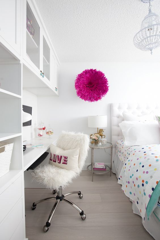 white clean room with pops of color and a desk nook