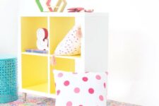DIY Kallax hack with new legs and bold yellow paint will be a nice idea for a colorful space or a kids’ room