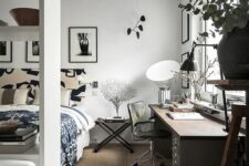 a cozy Nordic bedroom with a desk by a window