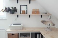a corner desk with a Kallax unit for storage attached under the tabletop is a cool solution for an attic room