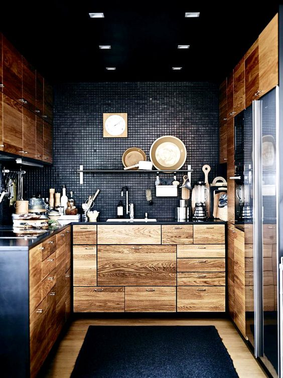 Black mixes with natural light colored wood cabinetry really well