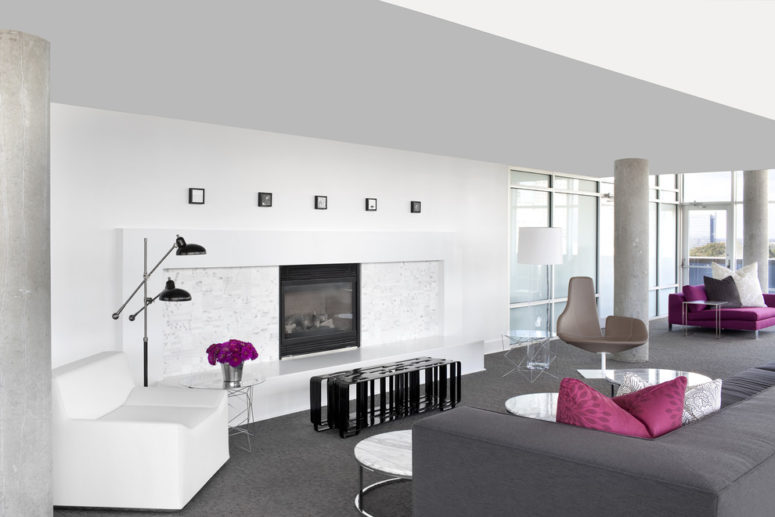 gray carpet in a contemporary living room with white walls