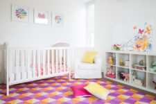 A contemporary KALLAX unit and other plain white furniture looks great on a colorful geometric area rug. (<a href="http://www.cpstyling.com.au">Carmen Parker Styling</a>)