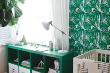 A green unit looks great with a green, patterned wallpaper in a gender neutral nursery. (<a href="http://www.emersongreydesigns.com/">Emerson Grey Designs</a>)