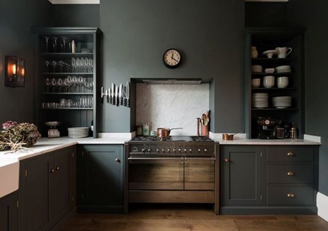 modern dark grey kitchen with natural wood cabinets