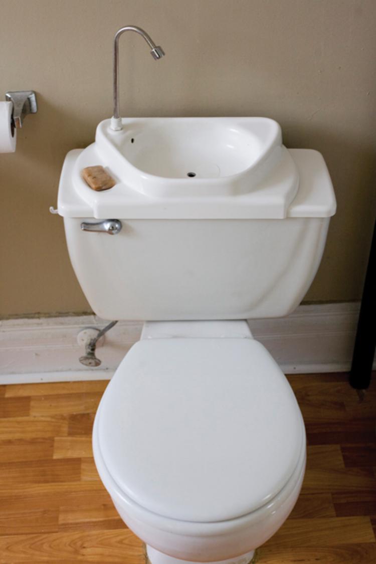 Nowadays you can buy a kit to replace a toilet's reservoir lid with a sink that activates when flushed. It's a great water-saving solution.