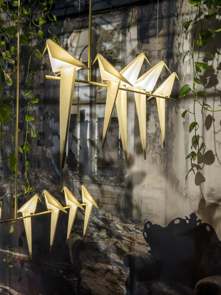 Perch Light Family lamps and chandliers are shaped as origami birds
