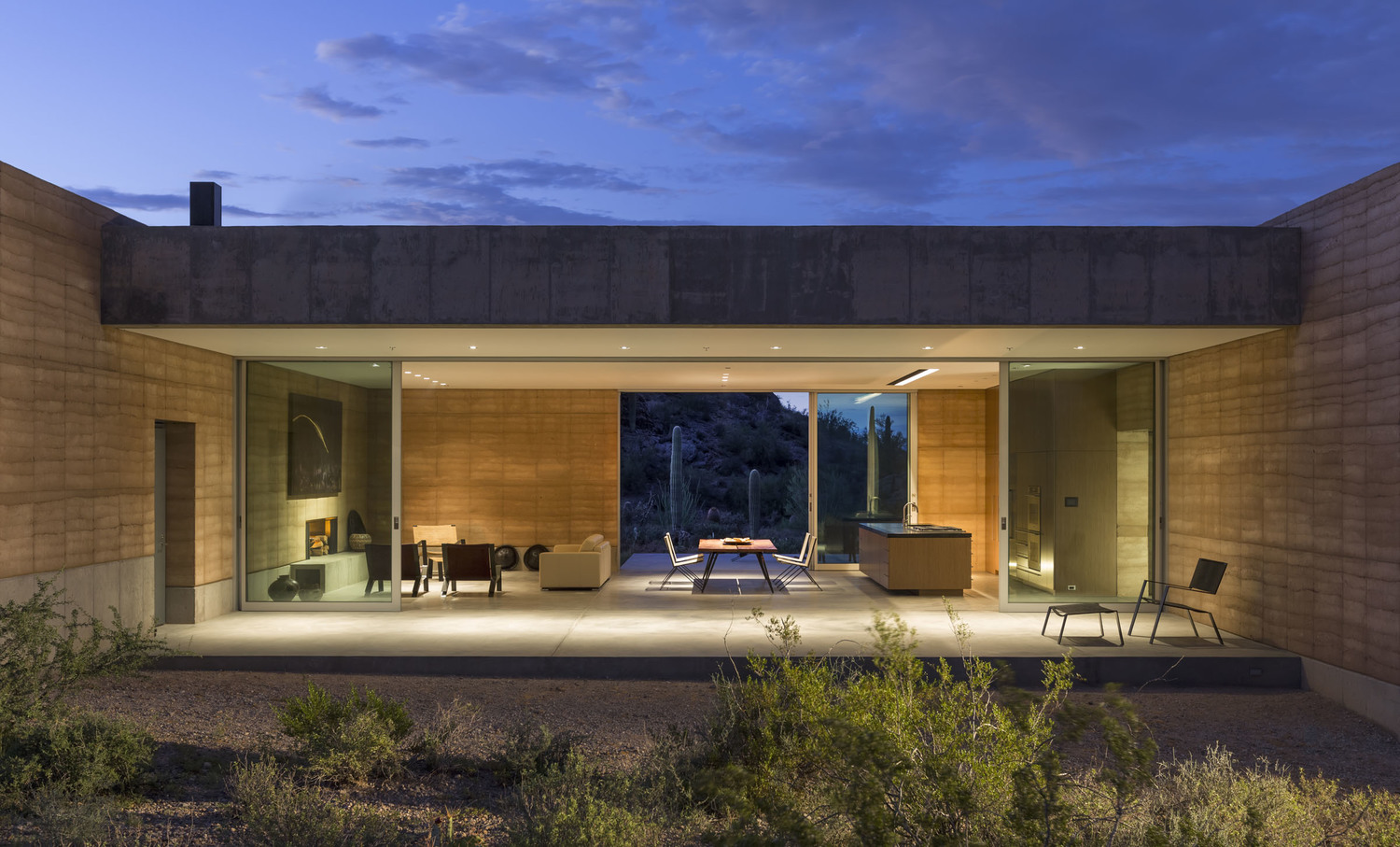 The architecture firm DUST is behind the Tucson Mountain Retreat, a rammed earth house located on the outskirts of the Sonoran Desert in Arizona