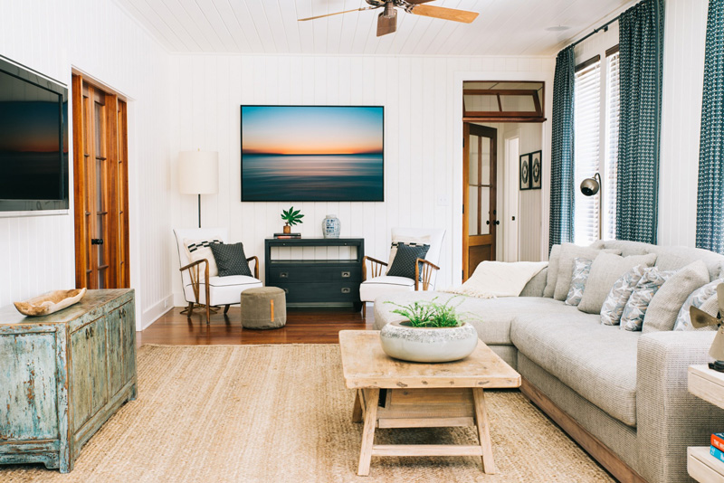 This modern beach cottage was designed by Cortney Bishop, and it's very comfy and inviting