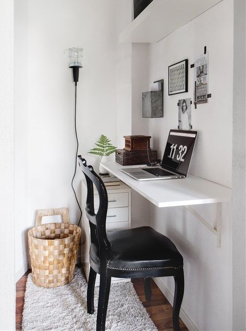 small home office nook with a small desk top