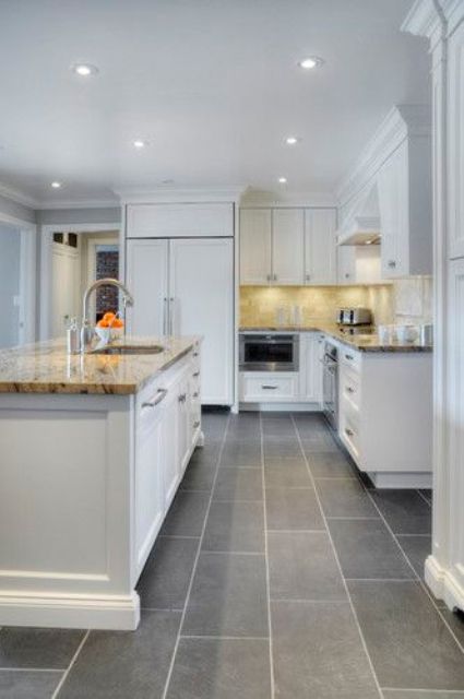 modern kitchen with grey floor tiles