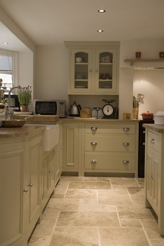 stone floor tiles are ideal for kitchen as it's a heavy traffic area