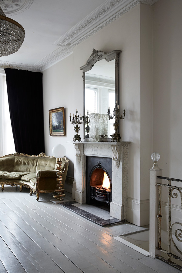 White and cream decor in various rooms create a perfect backdrop for vintage furniture