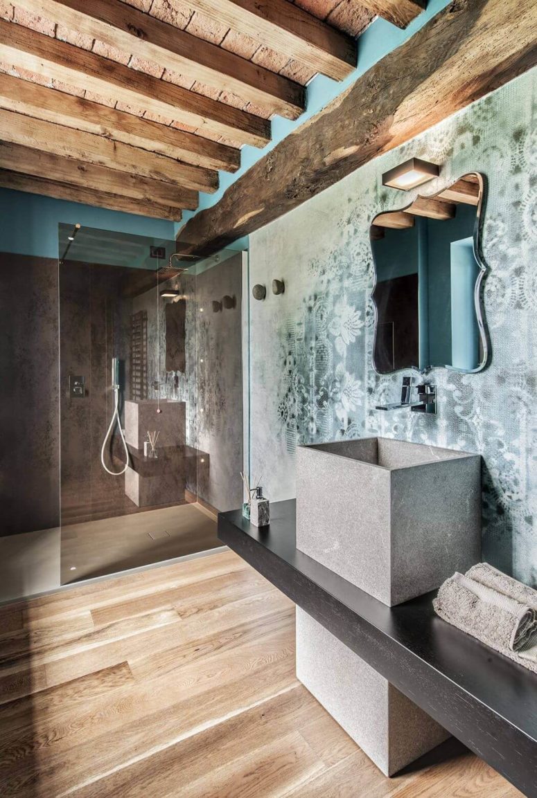 concrete, wood of various shades and that sutnning wallpaper look so amazing together