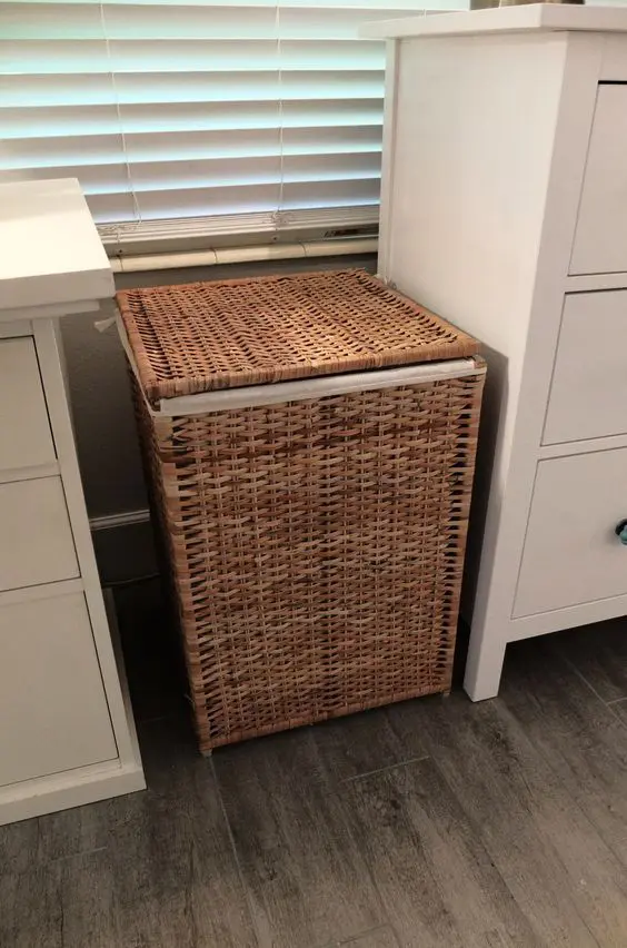 IKEA Branas is hand woven rattan piece, which can hide your laundry hampers