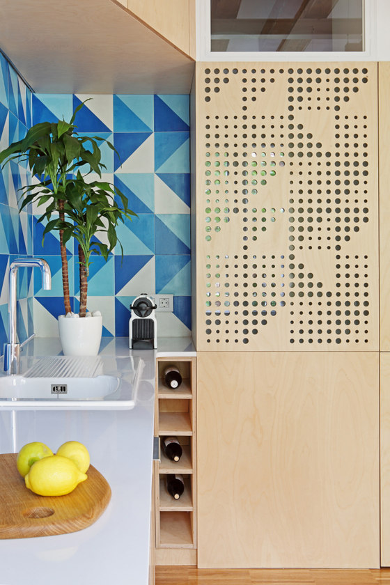 Perforated panel integrated into the kitchen furniture has mood light