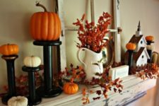 04 pumpkins on stands, faux leaves and a vintage window frame