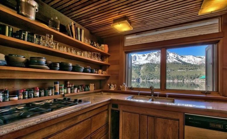 In the kitchen everything is covered and made of wood, and it also shows great views