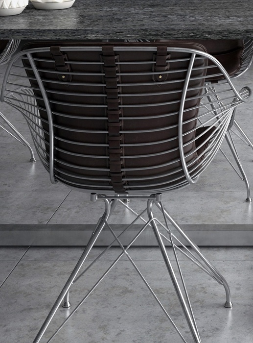 Metal grid chairs are covered with natural leather, which gives more masculinity to the space